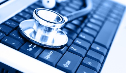 Sthétoscope sur un clavier-Santé au travail